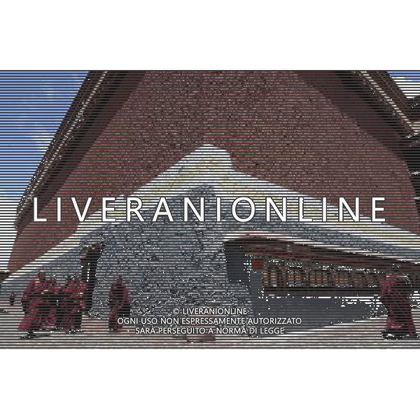 (110526) -- SAGYA, May 26, 2011 () -- Monks are seen in Sagya Monastery in Sagya County, southwest China\'s Tibet Autonomous Region, May 19, 2011. Sagya Monastery, a monastery of Sagayapa sect of Tibetan Buddhism, is known for housing numerous classical books on Buddhism and precious paintings. It was built in 1073 on the gray clay hill on the northern bank of the Chun Qu River in Sagya County, 149 kilometers from Xigaze Prefecture, and designed in a combined architectural style of China\'s Tibetan, Mogolian and Han ethnic groups. The monastery has been repaired and renovated from June 2002 to August 2009, sponsored by the governmental fund of more than 90 million yuan (13.85 million USD). (/Purbu Zhaxi) (zn) Il Tempio Tibetano Buddista di Sagya nella regione autonoma del Tibet AG. ALDO LIVERANI SAS ITYALY ONLY *** Local Caption *** .