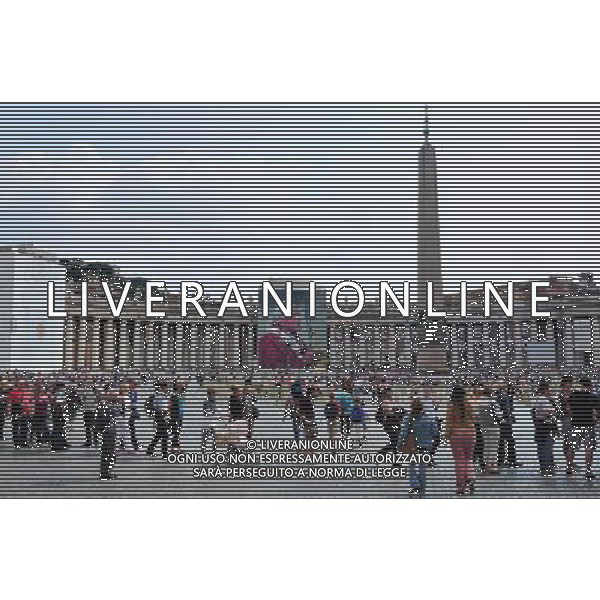 A giant banner bearing John Paul\'s portrait is unveiled over the facade of St Peter\'s basilica during the ceremony of beatification for late pope John Paul II on May 1, 2011 at St Peter\'s square at The Vatican. Photo by NEWSCOM OUT AG ALDO LIVERANI S A S ONLY ITALY