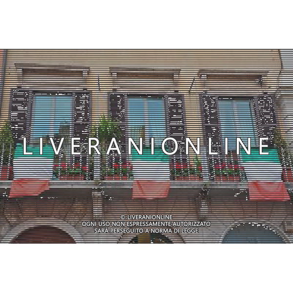 Italian flages hanged on a balcony in Rome.Photo by NEWSCOM OUT AG ALDO LIVERANI S A S