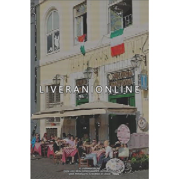 People are eating and drinking an Italian food in Italian resturant in Rome. Photo by NEWSCOM OUT AG ALDO LIVERANI S A S