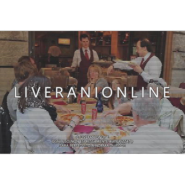 People are eating and drinking an Italian food in Italian resturant in Rome. Photo by NEWSCOM OUT AG ALDO LIVERANI S A S