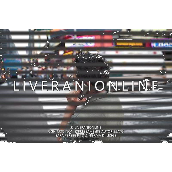 Users of cellular phones,in Times Square in New York on Tuesday, May 31, 2011. Research released by the World Health Organization advises that the use of wireless communication devices are \'possibly carcinogenic to humans\'. ©photoshot/Agenzia Aldo Liverani Sas - ITALY ONLY - Gli abitanti e Turisti a New York affollano la citta\' nell\'inizio non ufficiale dell\'estate