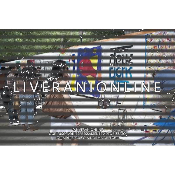 Artists work on their canvas\' at the Howl! Festival\'s \'Art Around the Park\' around Tompkins Square Park in New York\'s East Village. on Saturday, June 4, 2011. The festival, named after poet Allen Ginsberg\'s famous poem, celebrates the arts in the East Village and also consists of other events including performances and poetry readings. The artists are given canvas\' around the perimeter of the park where they work in public view, as a sort of counter-cultural Washington Square Art Show. (å© Richard B. Levine) /PHOTOSHOT/AG ALDO LIVERANI SAS - ITALY ONLY - *** Local Caption *** .