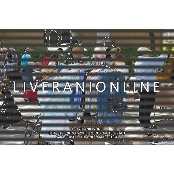 Shoppers search for bargains at the humongous Penn South Flea Market in the New York neighborhood of Chelsea on Saturday, June 4, 2011. Once a year the flea market, like Camelot, appears and the residents of the 20 building Penn South cooperatives clean out their closets in this giant flea market. (å© Richard B. Levine) /PHOTOSHOT/AG ALDO LIVERANI SAS - ITALY ONLY - *** Local Caption *** .