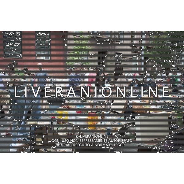 Shoppers search for bargains at the Jane Street Block Association Flea Market in the New York neighborhood of Greenwich Village on Saturday, June 4, 2011. The residents of Jane Street cleaned out their closets for their flea market. (å© Richard B. Levine) /PHOTOSHOT/AG ALDO LIVERANI SAS - ITALY ONLY - *** Local Caption *** .