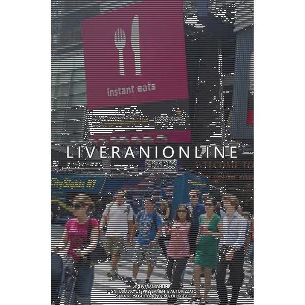 A billboard advertises Living Social\'s coupon website\'s instant eats on Thursday, June 9, 2011 in Times Square in New York. The couponer is offering short time frame deals in an effort to differentiate itself from competitors such as Groupon. With more and more coupon websites appearing, analysts feel that there will soon be a shakeout with only the major players surviving. The growth is similar to the dot-com boom years in the niche market of coupon sales. (å© Frances M. Roberts) /PHOTOSHOT/AG ALDO LIVERANI SAS - ITALY ONLY - *** Local Caption *** .