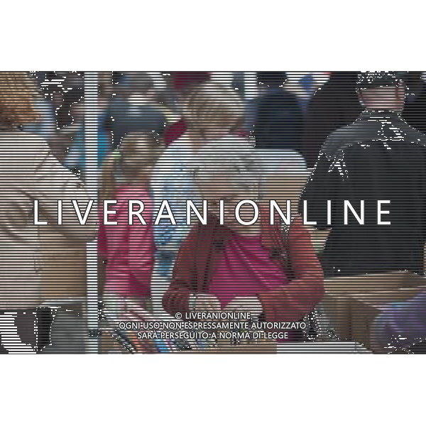 Shoppers search for bargains amidst the chaos of the Housing Works street fair in the New York neighborhood of Soho on Sunday, June 5, 2011. The service organization which aids people affected by HIV/AIDS holds it annual sale where thousands of books, movies, cds, records and articles of clothing are sold for a dollar or less, attracting thousands of people. (å© Richard B. Levine) /PHOTOSHOT/AG ALDO LIVERANI SAS - ITALY ONLY - *** Local Caption *** .