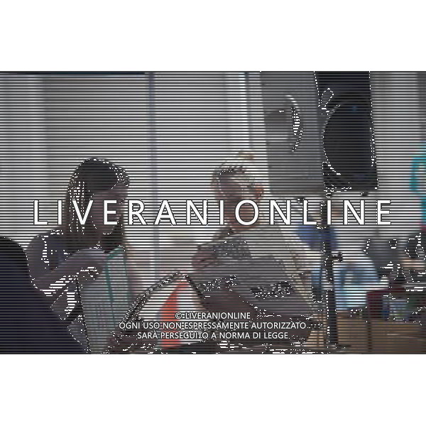 Shoppers search for bargains amidst the chaos of the Housing Works street fair in the New York neighborhood of Soho on Sunday, June 5, 2011. The service organization which aids people affected by HIV/AIDS holds it annual sale where thousands of books, movies, cds, records and articles of clothing are sold for a dollar or less, attracting thousands of people. (å© Richard B. Levine) /PHOTOSHOT/AG ALDO LIVERANI SAS - ITALY ONLY - *** Local Caption *** .