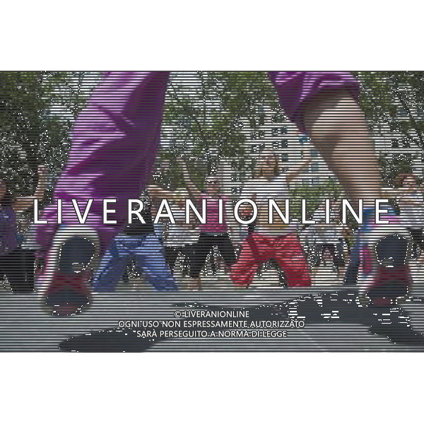 Exercisers participate in a Zumba class in Madison Square Park in New York on Monday, June 6, 2011 as part of the Parks \' Recreation Dept. BeFitNYC fitness activities. The city is offering a free or low cost programs to encourage physical activity and overall wellness in parks and recreation centers in the five boroughs and BeFitNYC on Facebook allows you to find, join and create group activities. (å© Richard B. Levine) /PHOTOSHOT/AG ALDO LIVERANI SAS - ITALY ONLY - *** Local Caption *** .