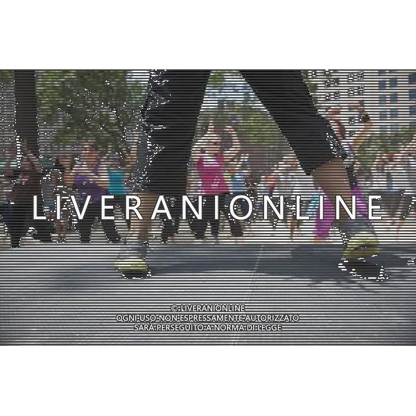 Exercisers participate in a Zumba class in Madison Square Park in New York on Monday, June 6, 2011 as part of the Parks \' Recreation Dept. BeFitNYC fitness activities. The city is offering a free or low cost programs to encourage physical activity and overall wellness in parks and recreation centers in the five boroughs and BeFitNYC on Facebook allows you to find, join and create group activities. (å© Richard B. Levine) /PHOTOSHOT/AG ALDO LIVERANI SAS - ITALY ONLY - *** Local Caption *** .