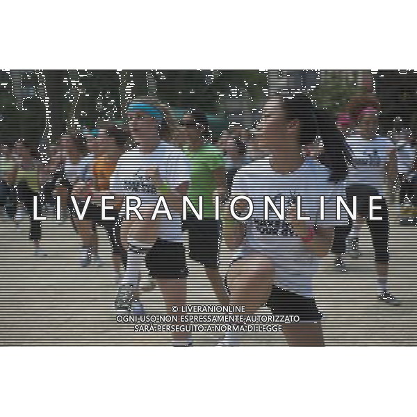 Exercisers participate in a Zumba class in Madison Square Park in New York on Monday, June 6, 2011 as part of the Parks \' Recreation Dept. BeFitNYC fitness activities. The city is offering a free or low cost programs to encourage physical activity and overall wellness in parks and recreation centers in the five boroughs and BeFitNYC on Facebook allows you to find, join and create group activities. (å© Richard B. Levine) /PHOTOSHOT/AG ALDO LIVERANI SAS - ITALY ONLY - *** Local Caption *** .