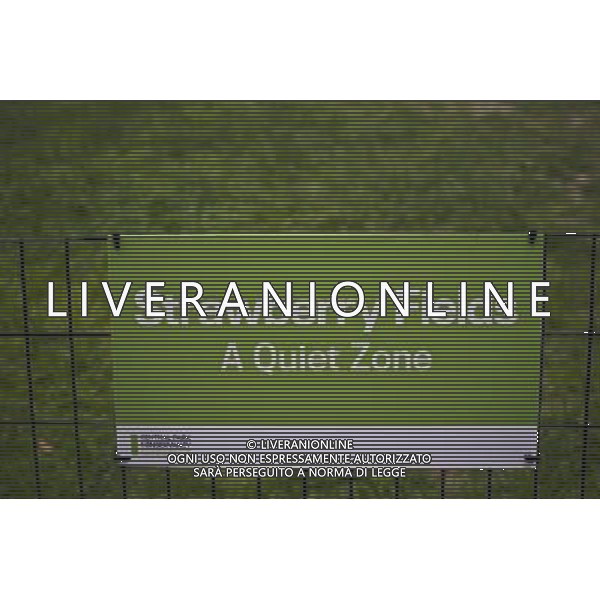 A Quiet Zone sign in Central Park in New York in Strawberry Fields in the park on Sunday, June 5, 2011. Musicians who play in the park are protesting against the crackdown by the Dept. of Parks and Recreation which prevents them from performing in \'quiet zones\' created by the park. Musicians have performed in Strawberry Fields since it was created after the death of Jon Lennon. Enforcement officers have started ticketing performers which they claim is a violation of their free speech rights. (å© Frances M. Roberts) /PHOTOSHOT/AG ALDO LIVERANI SAS - ITALY ONLY - *** Local Caption *** .