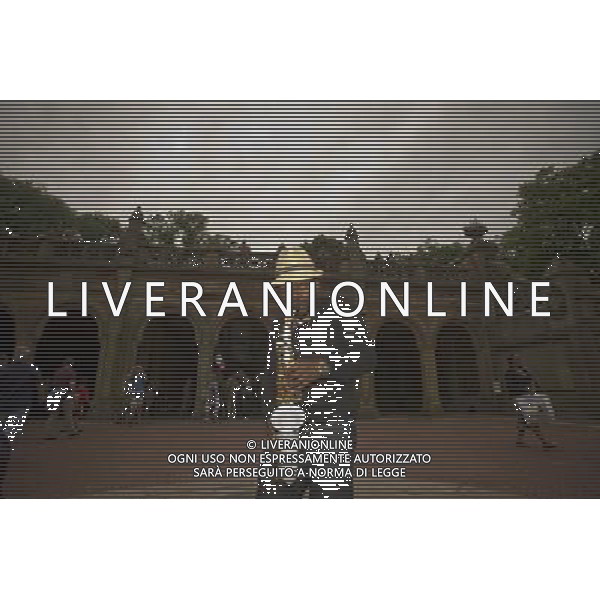 Alto saxophonist Rakiem Walker plays on Bethesda Terrace in Central Park in New York on Sunday, June 5, 2011 in front of a Quiet Zone sign. Musicians who play in the park are protesting against the crackdown by the Dept. of Parks and Recreation which prevents them from performing in \'quiet zones\' created by the park. Musicians have traditionally performed on Bethesda Terrace for over 100 years but the Central Park Conservancy wants to turn the area into a revenue generating food court so the enforcement officers have started ticketing performers which they claim is a violation of their free speech rights. (å© Frances M. Roberts) /PHOTOSHOT/AG ALDO LIVERANI SAS - ITALY ONLY - *** Local Caption *** .