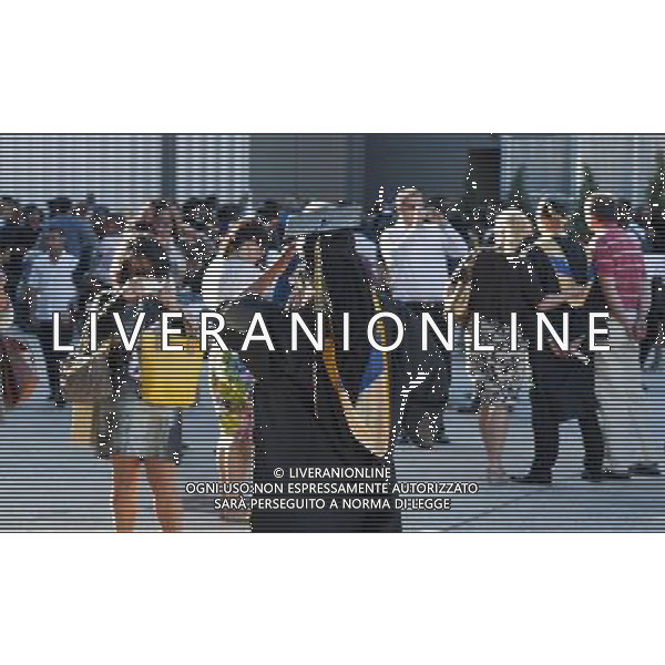 Very recent graduates and their friends and families outside of the Jacob Javits Convention Center in New York after the 45th commencement exercises of John Jay College of Criminal Justice,The City University of New York, on Friday, June 3, 2011. (å© Richard B. Levine) /PHOTOSHOT/AG ALDO LIVERANI SAS - ITALY ONLY - *** Local Caption *** .