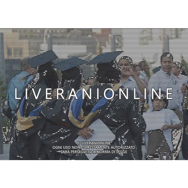 Very recent graduates and their friends and families outside of the Jacob Javits Convention Center in New York after the 45th commencement exercises of John Jay College of Criminal Justice,The City University of New York, on Friday, June 3, 2011. (å© Richard B. Levine) /PHOTOSHOT/AG ALDO LIVERANI SAS - ITALY ONLY - *** Local Caption *** .