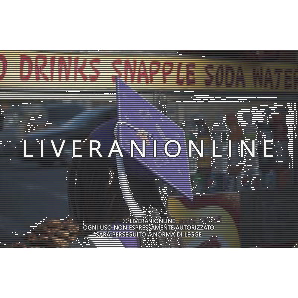 Very recent graduates and their friends and families outside of the Jacob Javits Convention Center in New York after the 203rd commencement exercises of Hunter College on Thursday, June 2, 2011. (å© Richard B. Levine) /PHOTOSHOT/AG ALDO LIVERANI SAS - ITALY ONLY - *** Local Caption *** .