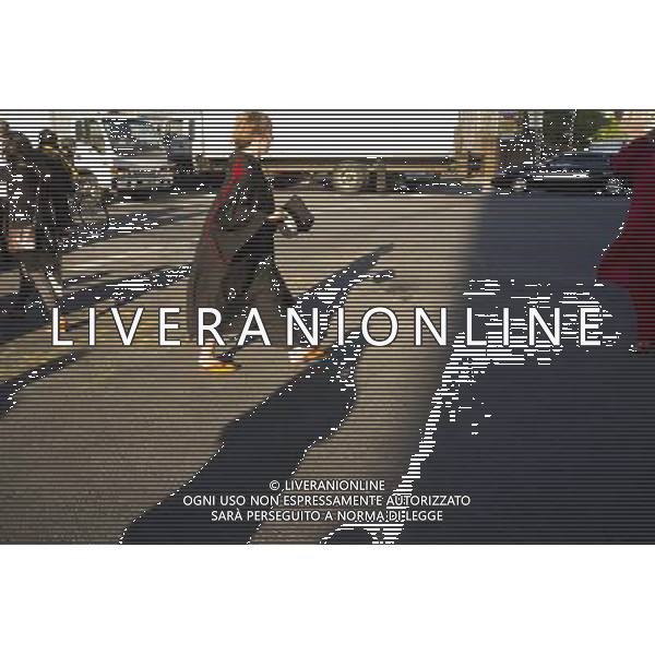 Very recent graduates and their friends and families outside of the Jacob Javits Convention Center in New York after the 45th commencement exercises of John Jay College of Criminal Justice,The City University of New York, on Friday, June 3, 2011. (å© Frances M. Roberts) /PHOTOSHOT/AG ALDO LIVERANI SAS - ITALY ONLY - *** Local Caption *** .