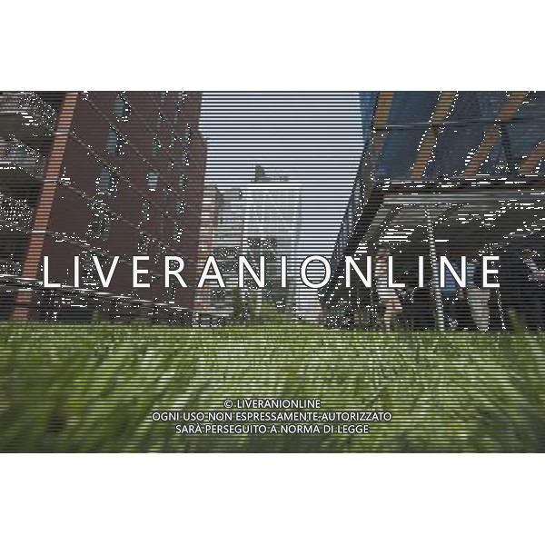 Visitors enjoy the Great Lawn area on opening day of the second phase, from West 20th Street to West 30th Street, of the High Line Park in Chelsea is seen on Tuesday, June 7, 2011. The new section includes the 4900 square foot lawn for visitors to sit and sunbathe as well as a \'flyover\' walkway that raises you eight feet above the foliage. Since the first section opened millions of dollars in real estate has been developed along the park. (Œ© Richard B. Levine) /PHOTOSHOT/AG ALDO LIVERANI SAS - ITALY ONLY - *** Local Caption *** .