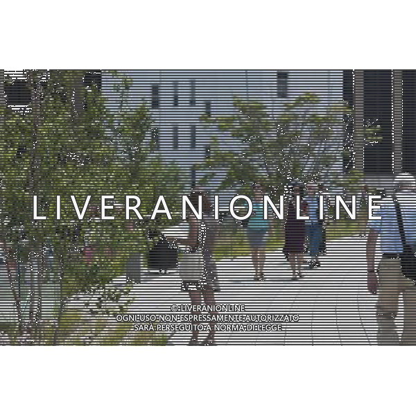 Opening day of the second phase, from West 20th Street to West 30th Street, of the High Line Park in Chelsea is seen on Tuesday, June 7, 2011. The new section includes a lawn for visitors to sit and sunbathe as well as a \'flyover\' walkway that raises you eight feet above the foliage. Since the first section opened millions of dollars in real estate has been developed along the park. (Œ© Richard B. Levine) /PHOTOSHOT/AG ALDO LIVERANI SAS - ITALY ONLY - *** Local Caption *** .