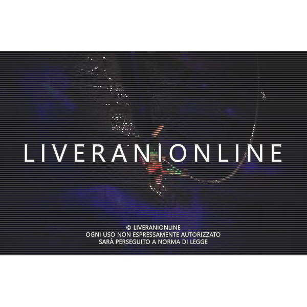 JERUSALEM, June 15, 2011 An acrobat performs in \'The Butterfly Effect\', accompanied by video projection and innovative flight systems, during the 3rd Jerusalem Festival of Light, on the wall of the Old City of Jerusalem, June 15, 2011. \'The Butterfly Effect\' tells the story of two ancient cultures, fighting one another for the control of light. (/Yin Dongxun) AG ALDO LIVERANI S A S ONLY ITALY