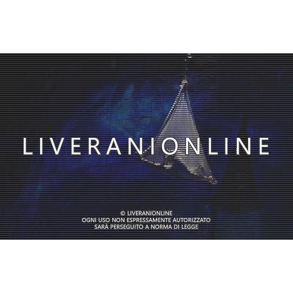 JERUSALEM, June 15, 2011 An acrobat performs in \'The Butterfly Effect\', accompanied by video projection and innovative flight systems, during the 3rd Jerusalem Festival of Light, on the wall of the Old City of Jerusalem, June 15, 2011. \'The Butterfly Effect\' tells the story of two ancient cultures, fighting one another for the control of light. (/Yin Dongxun) AG ALDO LIVERANI S A S ONLY ITALY