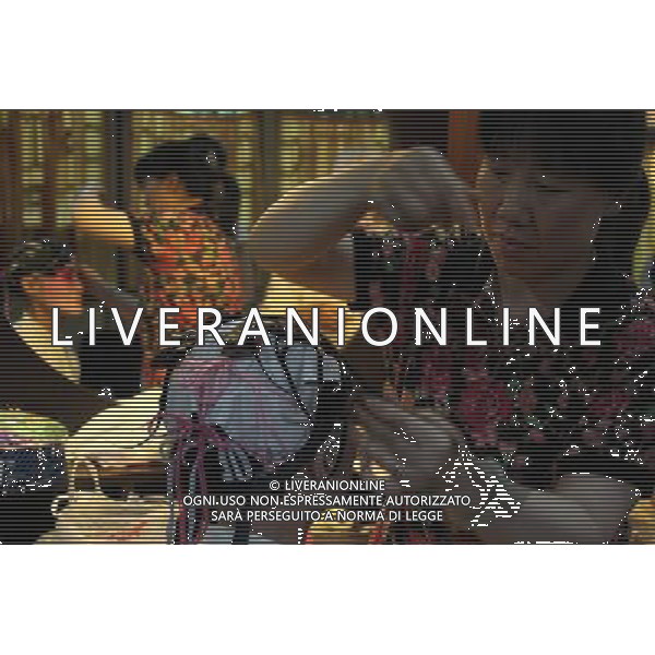 (110619) -- BEIJING, June 19, 2011 -- An assistant applies make-up to an opera singer from the Jiangsu Provincial Kun Opera Troupe backstage before a performance in Beijing, capital of China, June 18, 2011. A joint performance was staged here Saturday to mark the 10th anniversary of Kun Opera\'s inscription on the World Heritage list. Kun Opera, or \'Kun Qu\' as it is called in Chinese, is one of the oldest extant forms of the Chinese opera, which dates back more than 600 years. Tang Shizeng) (ljh) AG ALDO LIVERANI S A S ONLY ITALY