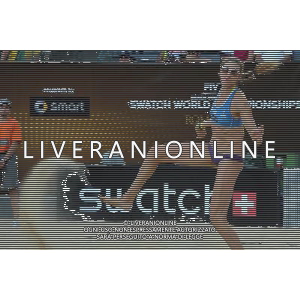 (110619) -- ROME, June 19, 2011 -- Olympic champion Kerri Walsh kicks sands up during the women\'s semifinal between United States\' Misty May-Treanor/Kerri Walsh and China\'s pair Xue Chen/Zhang Xi at the 2011 FIVB Beach Volleyball World Championships in Rome, Italy, June 18, 2011. May-Treanor/Walsh won 2-1 to enter the final. Wang Qingqin) AG ALDO LIVERANI S A S ONLY ITALY