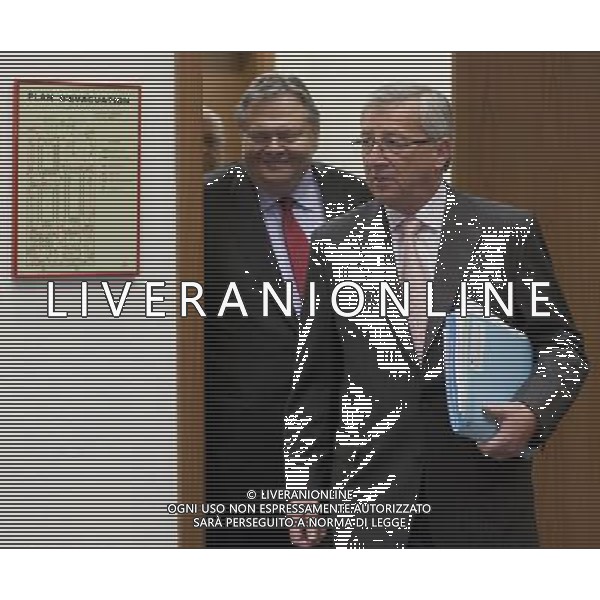 (110619) -- Brussels, June. 19, 2011 -- The new Greek finance Minister Evangelos Venizelos (L) and the Luxembourg Prime Minister, President of the Eurogroup Jean-Claude Juncker (R) arrive for an Eurogroup Ministers Council meeting in the EU headquarter, on Sunday June 19; 2011, in Luxembourg. AG ALDO LIVERANI S A S ONLY ITALY