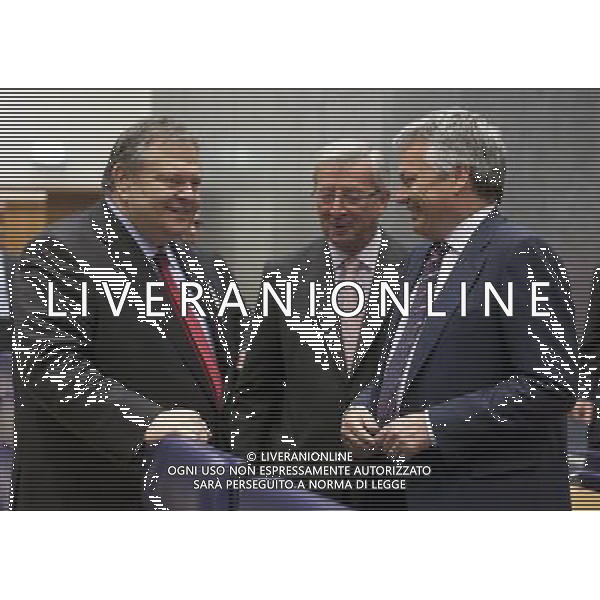 (110619) -- Brussels, June. 19, 2011 -- The new Greek finance Minister Evangelos Venizelos (L) talks with the Luxembourg Prime Minister, President of the Eurogroup Jean-Claude Juncker (C) and the Belgium Minister of Finance \' Institutional Reform Didier Reynders (R) prior an Eurogroup Ministers Council meeting in the EU headquarter, on Sunday June 19; 2011, in Luxembourg. AG ALDO LIVERANI S A S ONLY ITALY