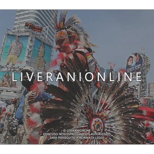 (110621) -- TORONTO, June 21, 2011 () -- An Aboriginal performs during the event marking the National Aboriginal Day at the Yonge-Dundas Square in central Toronto, Canada, June 21, 2011. The National Aboriginal Day is annually held on June 21 in Canada to celebrate the unique heritage, diverse cultures, and outstanding achievements of the nation\'s Aboriginal peoples. (/Zou Zheng) (wjd) L\'annuale Giornata Nazionale aborigena per celebrare il patrimonio unico, la diverse culture, e le realizzazioni eccezionali dei popoli aborigeno del Canada . Ag. Aldo Liverani sas - ITALY ONLY *** Local Caption *** .