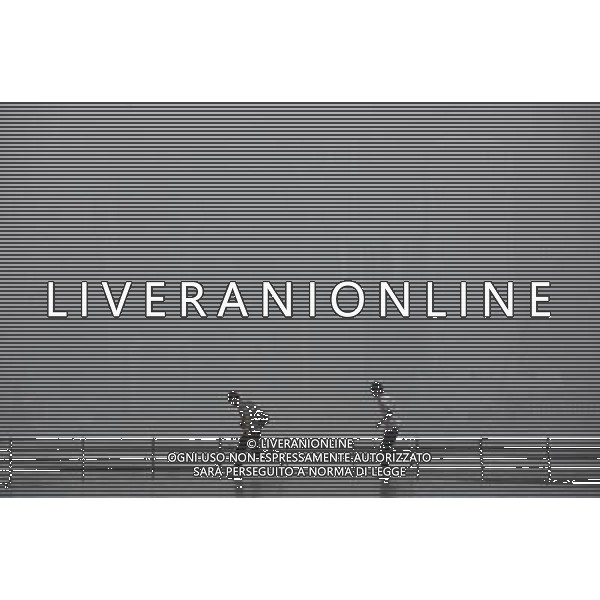 (110621) -- HONG KONG, June 21, 2011 () -- Tourists walk at Tsim Sha Tsui, an urban area in Hong Kong, south China, June 21, 2011. Hong Kong Observatory issued a warning of tropical storm on Tuesday. It is predicted that strong wind and heavy rain will hit the city in the next few days. (/Lui Siu Wai) (zhs) Maltempo a Hong Kong , pioggia , nubi , AG. ALDO LIVERANI SAS - ITALY ONLY *** Local Caption *** .