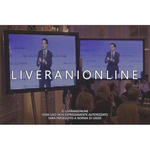 Leader of the Labour Party Ed Miliband addresses the Times CEO Summit at the Savoy Hotel in central London, watched by Times Editor James Harding. ©photoshot/Agenzia Aldo Liverani Sas - ITALY ONLY - Vertice Ceo del Times al Savoy Hotel nel centro di Londra