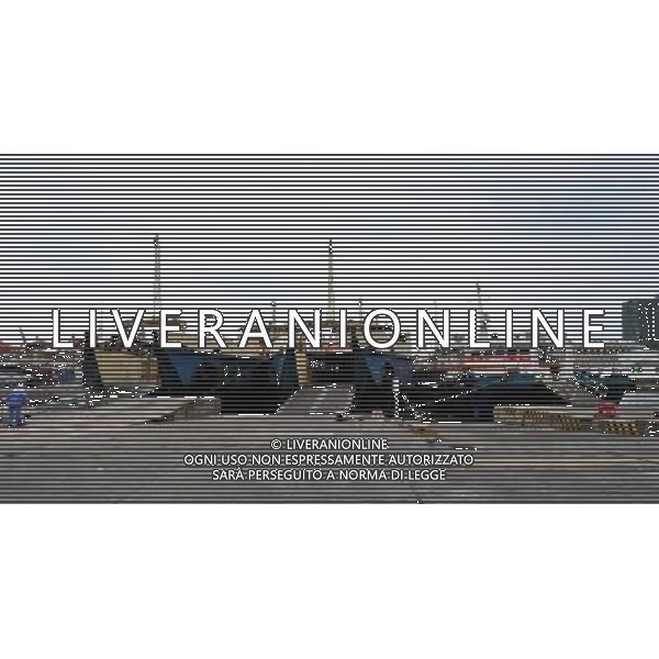 HAIKOU, June. 22, 2011 Ships anchor at a harbor in Haikou, south China\'s Hainan Province, June. 22, 2011. As the fourth tropical storm of this year approaches, local maritime affairs authorities on Wednesday suspended part of shipping services across the Qiongzhou Strait. (/Hou Jiansen)(mcg) Porto di Haikou , sospesi i servizi di navigazione attraverso lo stretto Qiongzhou per l\'imminente arrivo di una tempesta tropicale - AG. ALDO LIVERANI SAS - ITALY ONLY *** Local Caption *** .