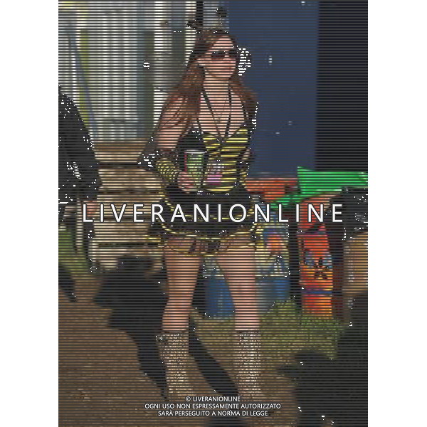 Picture Shows: Festival goer in the VIP area at Glastonbury 2011. Thursday June 23, 2011.