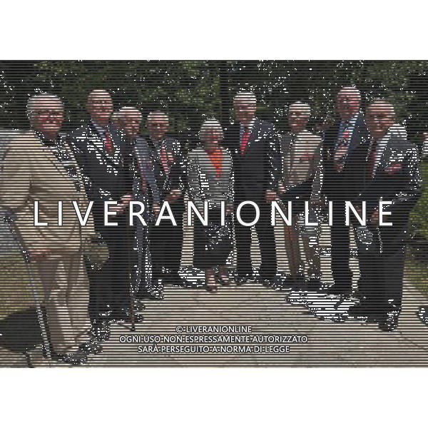 SISAK, June 22, 2011 Croatian President Ivo Josipovic (4th R) poses for photos with decorated anti fascist partisan veterans during a memorial ceremony in Brezovica Forest near Sisak, Croatia, June 22, 2011. The main commemoration observing Croatia\'s Anti Fascist Struggle Day marks the 70th anniversary of the establishment of the first anti fascist armed unit in Croatia. First partisans brigade was formed in Croatian Brezovica forest on June 22, 1941. (/Miso Lisanin) (msq)