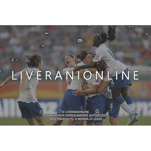 WOLFSBURG, June 27, 2011 England\'s Fara Williams (3rd R) celebrates after scoring during the first round Group B match against Mexico at the FIFA Women\'s World Cup Germany 2011 at the Arena im Allerpark in Wolfsburg, north Germany, June 27, 2011. The match ended in a 1 1 draw. (/Ding Xu)(wjd)