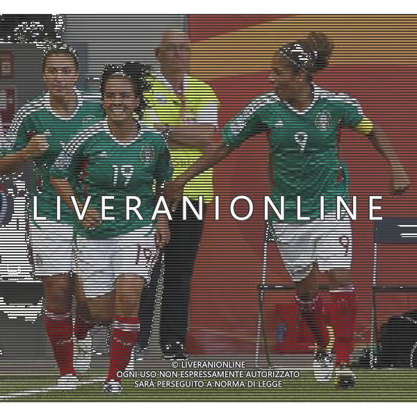 WOLFSBURG, June 27, 2011 Mexico\'s Monica Ocampo (C) celebrates with her teammates after scoring during the first round Group B match against England at the FIFA Women\'s World Cup Germany 2011 at the Arena im Allerpark in Wolfsburg, north Germany, June 27, 2011. The match ended in a 1 1 draw. (/Ding Xu)(wjd)