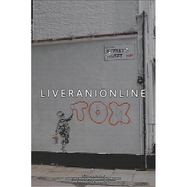 Overnight a new Banksy called \'TOX\' appeared on the Jeffrey\'s Street wall of Rob Skipper\'s flat 174 Camden Street, Camden, London, United Kingdom - image taken before local conservation group could arrive with rollers and paint over it. Date:22/06/2011 Ref: