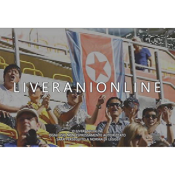 (110629) -- DRESDEN, June 29, 2011 () -- Fans of the Democratic People\'s Republic of Korea (DPRK) cheer for the team during the Group C first round match between the United States and the Democratic People\'s Republic of Korea (DPRK) at the 2011 FIFA Women\'s World Cup at the Rudolf-Harbig-Stadion in Dresden, Germany, June 28, 2011. (/Ding Xu)