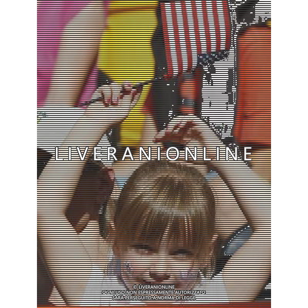 (110629) -- DRESDEN, June 29, 2011 (Xinhua) -- A little fan of the United States cheers for the team during the Group C first round match between the United States and the Democratic People\'s Republic of Korea (DPRK) at the 2011 FIFA Women\'s World Cup at the Rudolf-Harbig-Stadion in Dresden, Germany, June 28, 2011. (Xinhua/Ding Xu)