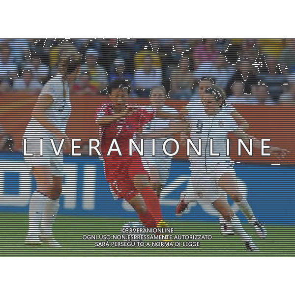 (110629) -- DRESDEN, June 29, 2011 (Xinhua) -- Yun Hyon Hi (2nd L) of the Democratic People\'s Republic of Korea (DPRK) vies with Heather O Reilly (front R) of the United States during their Group C first round match at the 2011 FIFA Women\'s World Cup at the Rudolf-Harbig-Stadion in Dresden, Germany, June 28, 2011. (Xinhua/Li Jundong)