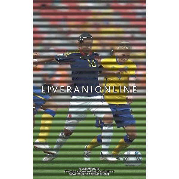 (110628) -- LEVERKUSEN, June 28, 2011 () -- Lady Andrade(L) of Colombia vies with Annica Svensson of Sweden during the first round Group C football match between Colombia and Sweden at the FIFA Women\'s World Cup Germany 2011 in Leverkusen, Germany, June 28, 2011. (/Ma Ning)