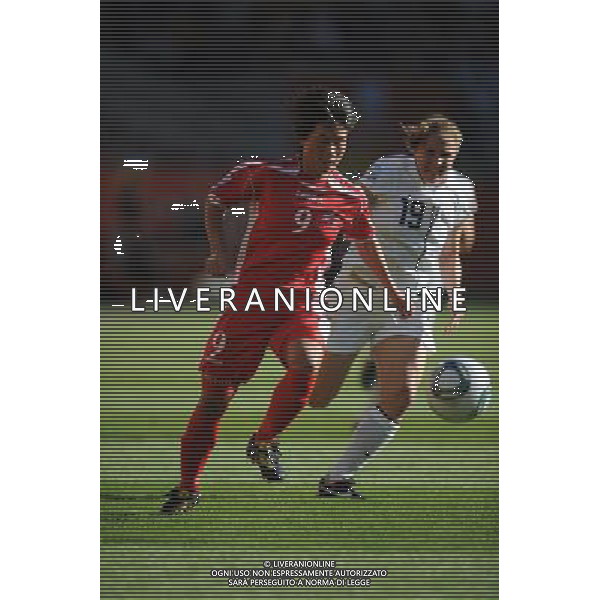 (110629) -- DRESDEN, June 29, 2011 () -- Ra Un Sim (L) of the Democratic People\'s Republic of Korea (DPRK) competes during the Group C first round match against the United States at the 2011 FIFA Women\'s World Cup at the Rudolf-Harbig-Stadion in Dresden, Germany, June 28, 2011. (/Li Jundong)