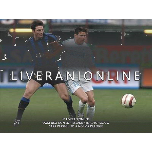 MILANO 14/04/04 QUARTI DI FINALE DI COPPA UEFA 2003/04 INTER-MARSIGLIA NELLA FOTO ZANETTI JAVIER COON MERIEM CAMEL PH GIGI ARCAINI/AG.ALDO LIVERANI