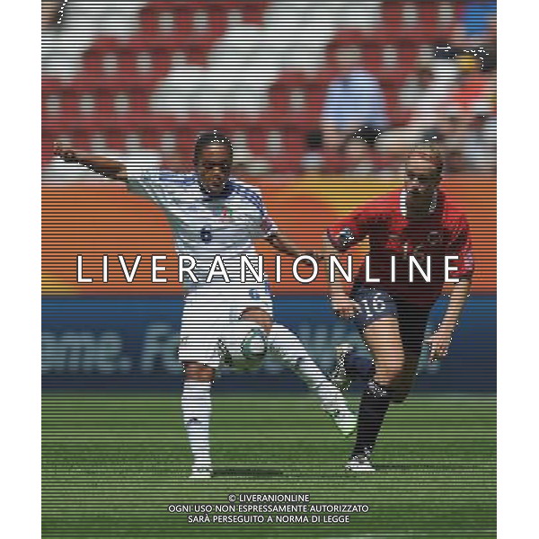(110629) -- AUGSBURG, Jun. 29, 2011 () -- Vania (L) of Equatorial Guinea vies with Elise Thorsnes of Norway during the Group D match at the 2011 FIFA Women\'s World Cup in Augsburg, Germany, June 29, 2011. (/Li Jundong)