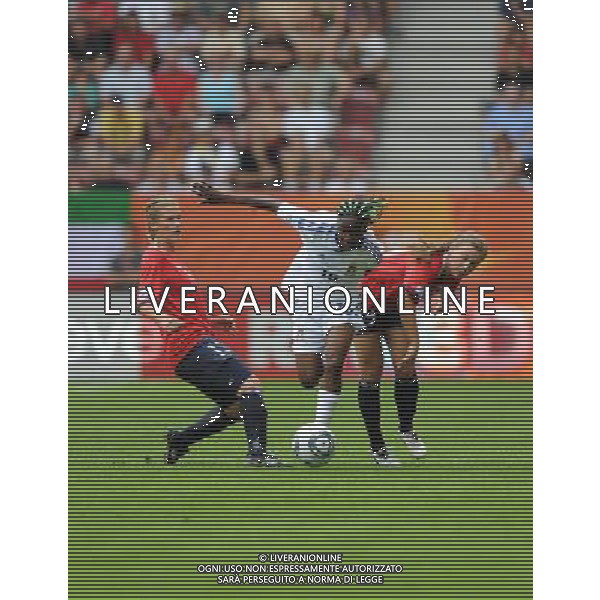 (110629) -- AUGSBURG, June 29, 2011 () -- Anonman (C) of Equatorial Guinea competes during the Group D match between Norway and Equatorial Guinea at the FIFA Women\'s World Cup Germany 2011 in Augsburg, Germany, June 29, 2011. (/Xu Liang)