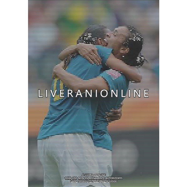 (110630) -- MONCHEGLADBACH, June 30, 2011 () -- Brazilian player Rosana (L) celebrates her goal with teammate Marta during the first round Group D match between Brazil and Australia at the FIFA Women\'s World Cup Germany 2011 in Monchengladbach, Germany, June 29, 2011.Brazil won with 1-0. (/Wu Wei)