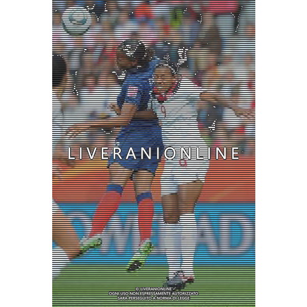 (110630) -- BOCHUM, June 30, 2011 () -- Candace Chapman (R) of Canada and Marie-Laure Delie of France fight for the ball during the second round Group A match between Canada and France at the FIFA Women\'s World Cup Germany 2011 in Bochum, Germany, June 30, 2011. (/Ma Ning) (zw)