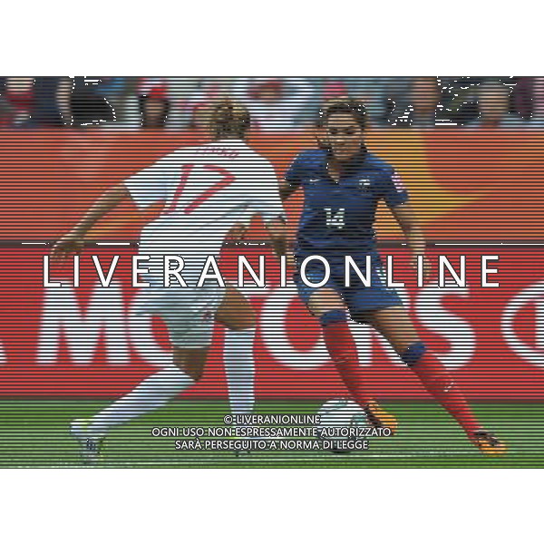 (110630) -- BOCHUM, June 30, 2011 () -- Louisa Necib (R) of France drives the ball during the second round Group A match between Canada and France at the FIFA Women\'s World Cup Germany 2011 in Bochum, Germany, June 30, 2011. France won the match 4-0. (/Ma Ning) (zw)