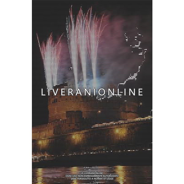 (110629) -- ROME, June 29, 2011 () -- Fireworks explode over the Saint Angel Castle (Castel Sant\'Angelo) and bridge during an annual event to celebrate the patron Saints Peter and Paul in Rome, Italy, June 29, 2011. (/Wang Qingqin)